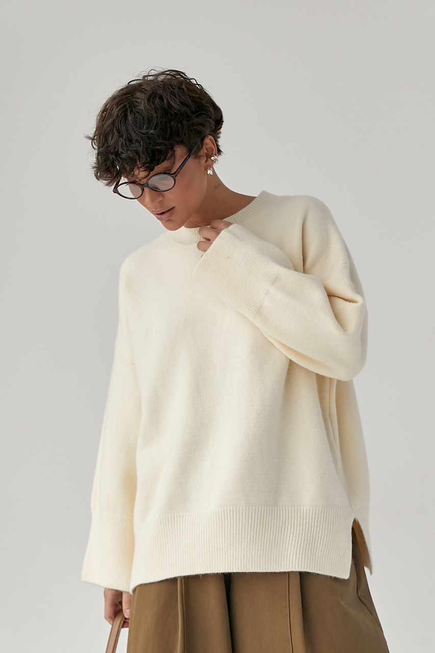 Вільний в'язаний джемпер із розрізами LX-10717947 Вільний в'язаний джемпер із розрізами LX-10717947