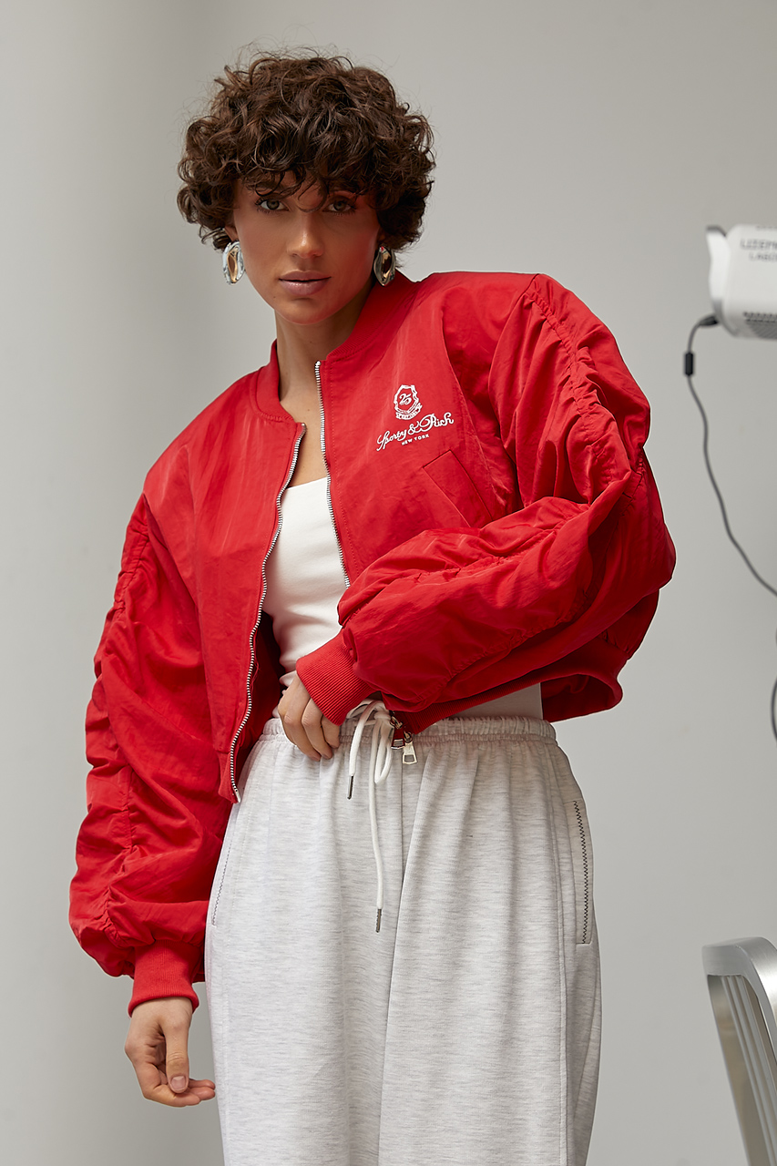 Жіноча вітровка-бомбер з об'ємними рукавами LX-10733521 Жіноча вітровка-бомбер з об'ємними рукавами LX-10733521