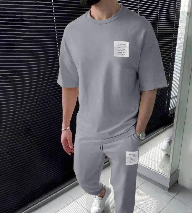 Спортивный костюм унисекс из двунитки с футболкой и брюками с карманами на резинке демисезонный