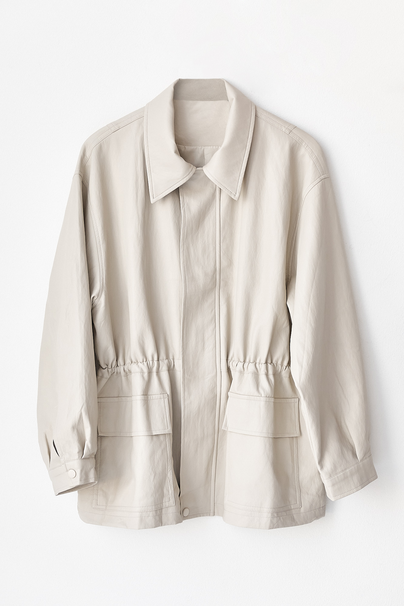 Жіноча подовжена куртка зі шкірозамінника  lx-2048