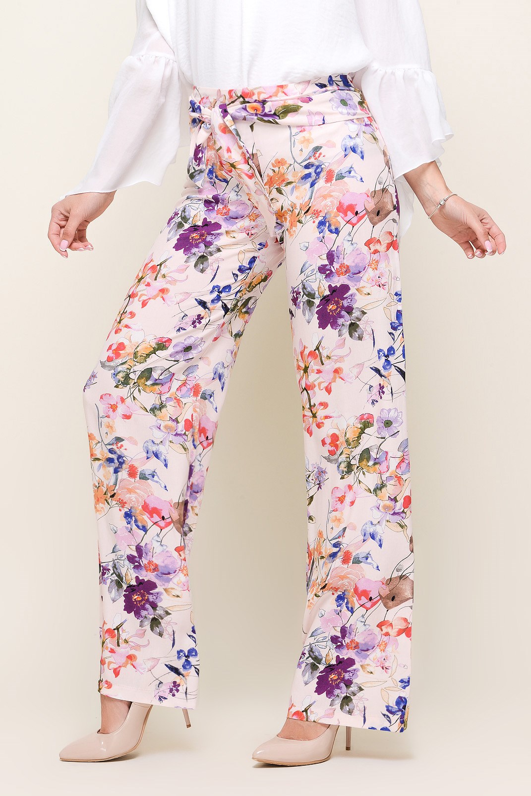 Персиковые брюки в цветочек 32952